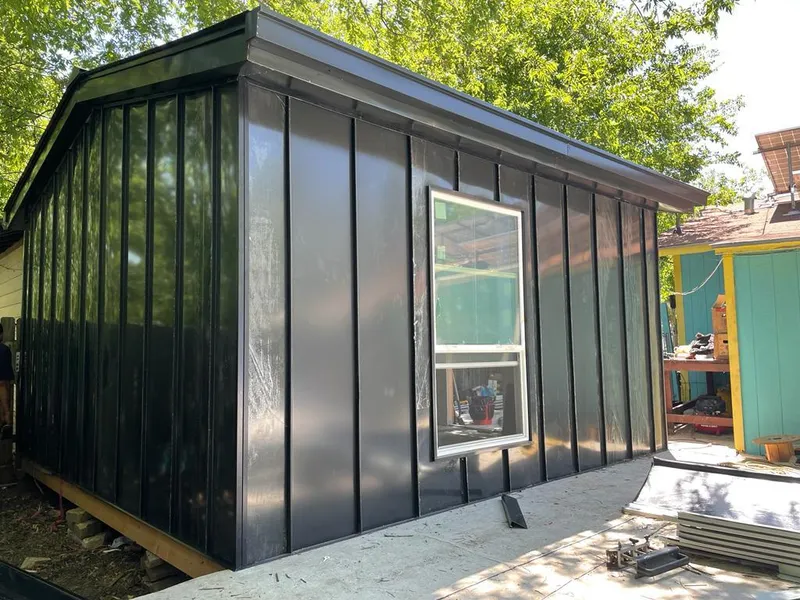 Black standing seam metal wall panels for Roof Inspection in Guntersville